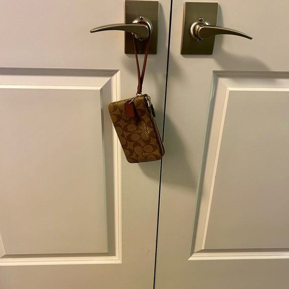 Coach Wristlet in Signature Canvas. - Picture 8 of 10